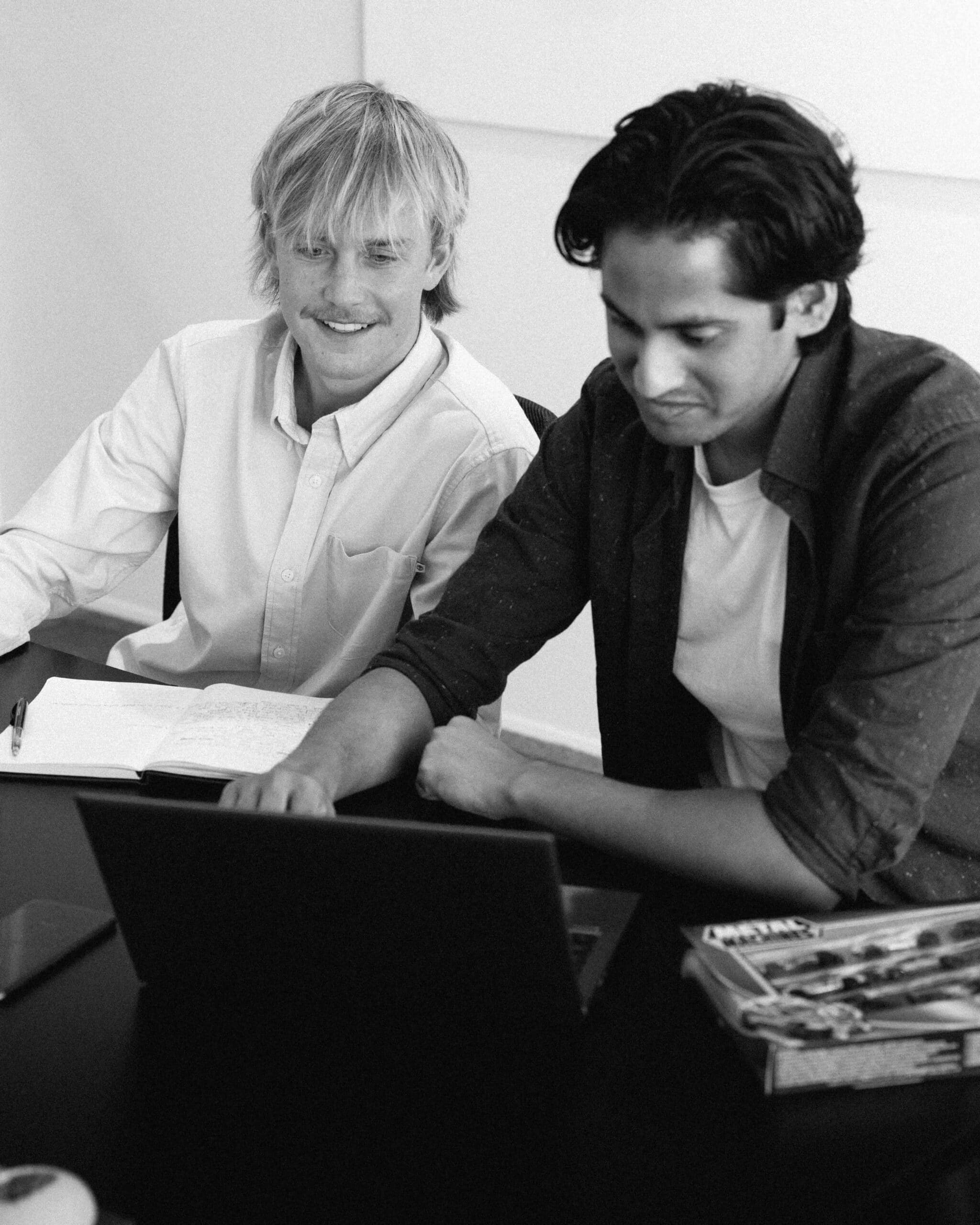 Interns working on computer